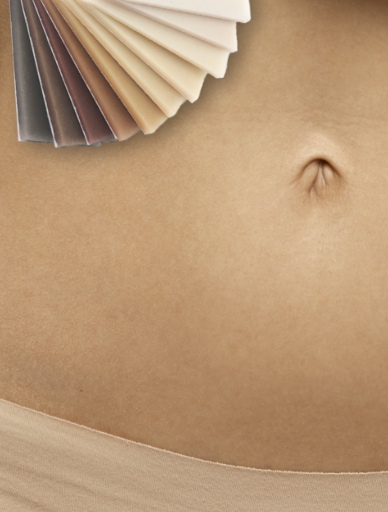 The Moonbump skin tone colour swatches held against a woman's skin