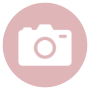 Pink circle with a white camera icon inside.