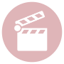 Pink circle with a white clapperboard icon inside.