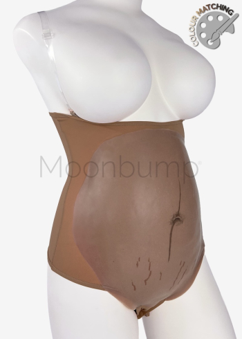3-4 Month silicone imitation pregnancy belly, in colour M7 'chocolate brown' with linea nigra & stretch marks, shown on a mannequin